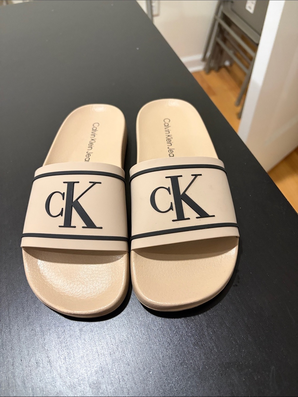 Calvin Klein Jeans Beige Slide Sandals with Black CK Logo US 8 worn once!
